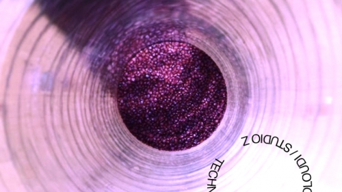Image of a purple swirl with a darker purple center with "Technoutopias" written in the corner