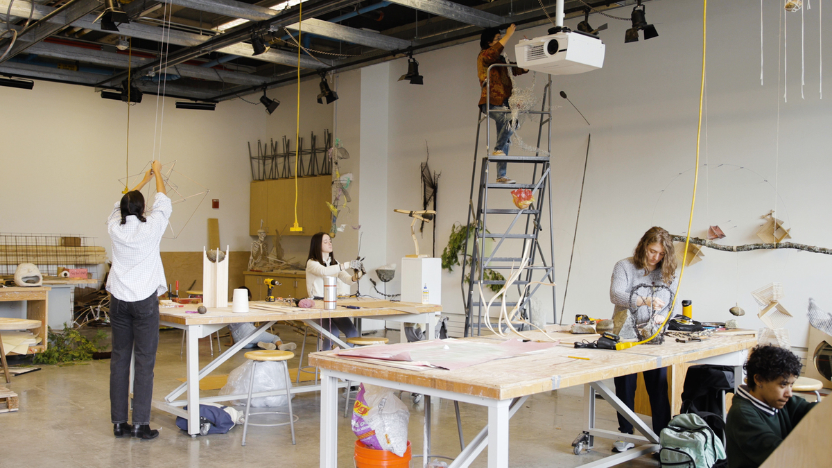 Students creating sculptures